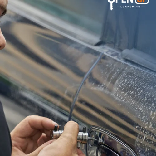 Auto locksmith picking a car door lock in Seattle