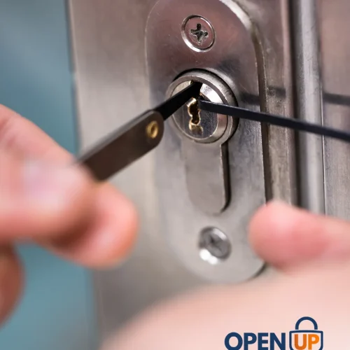 Commercial locksmith picking an industrial lock in Seattle